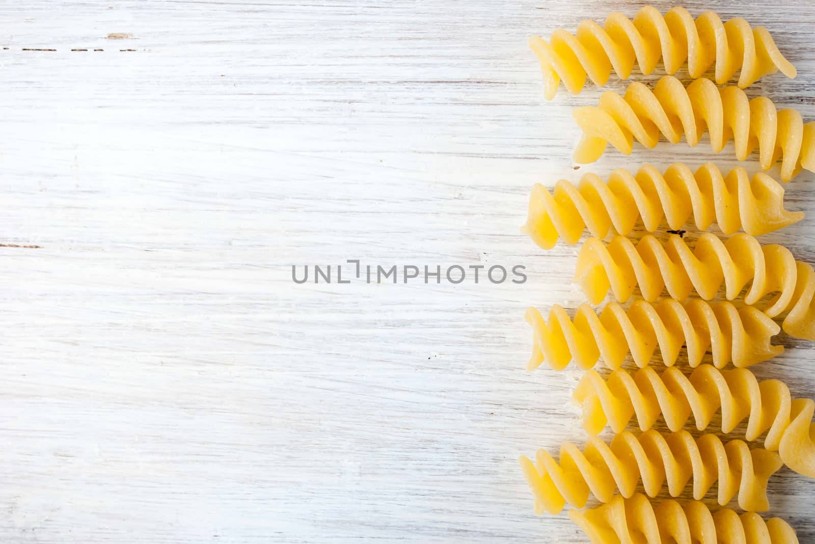 Pasta at the left of the white table horizontal