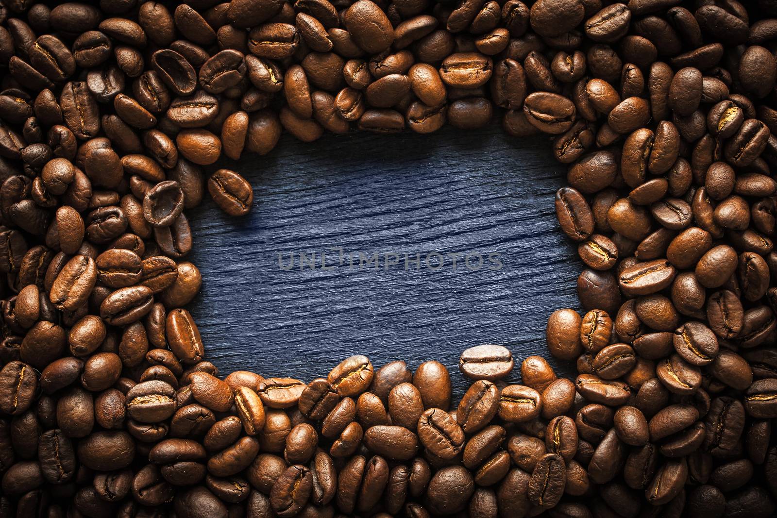 Coffee bean frame on the dark background by Deniskarpenkov