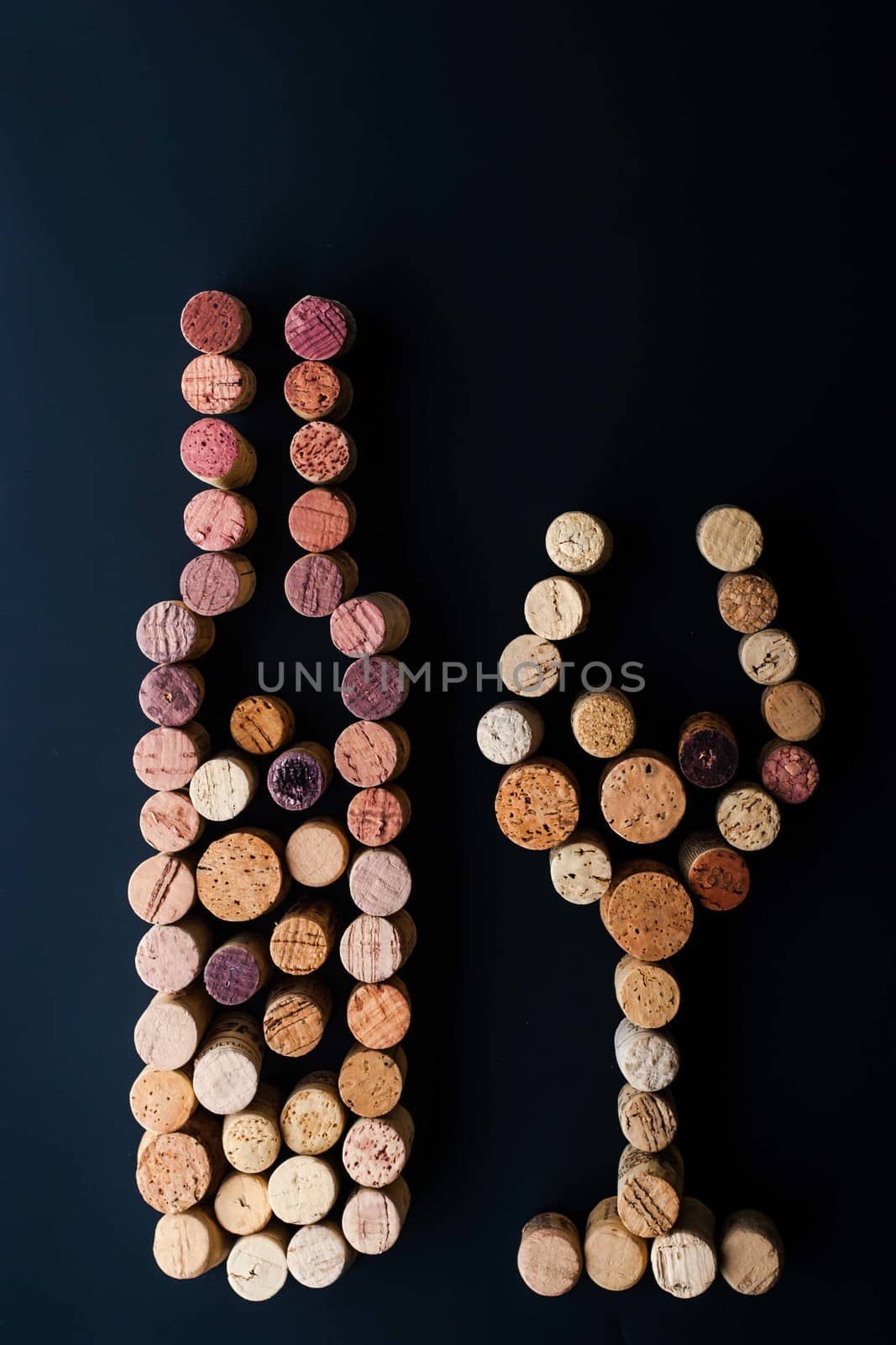 Wine bottle and glass made by corks vertical