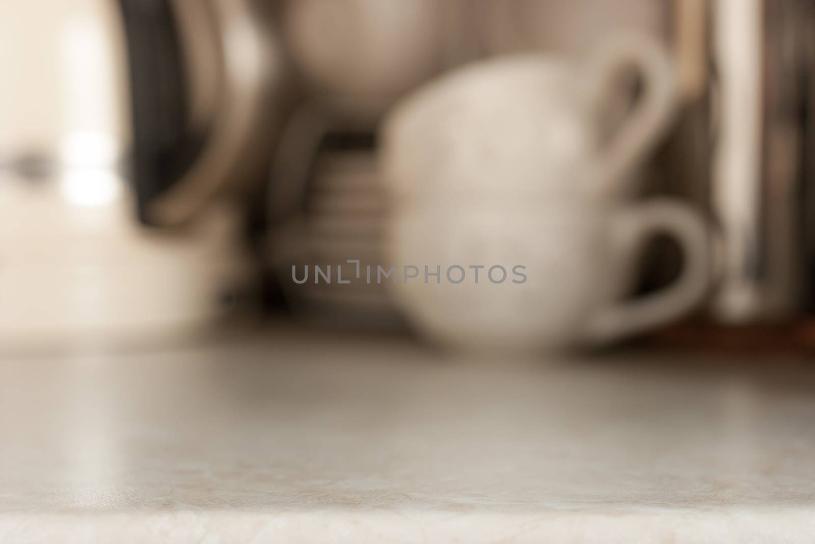 White ceramic cups blurred background