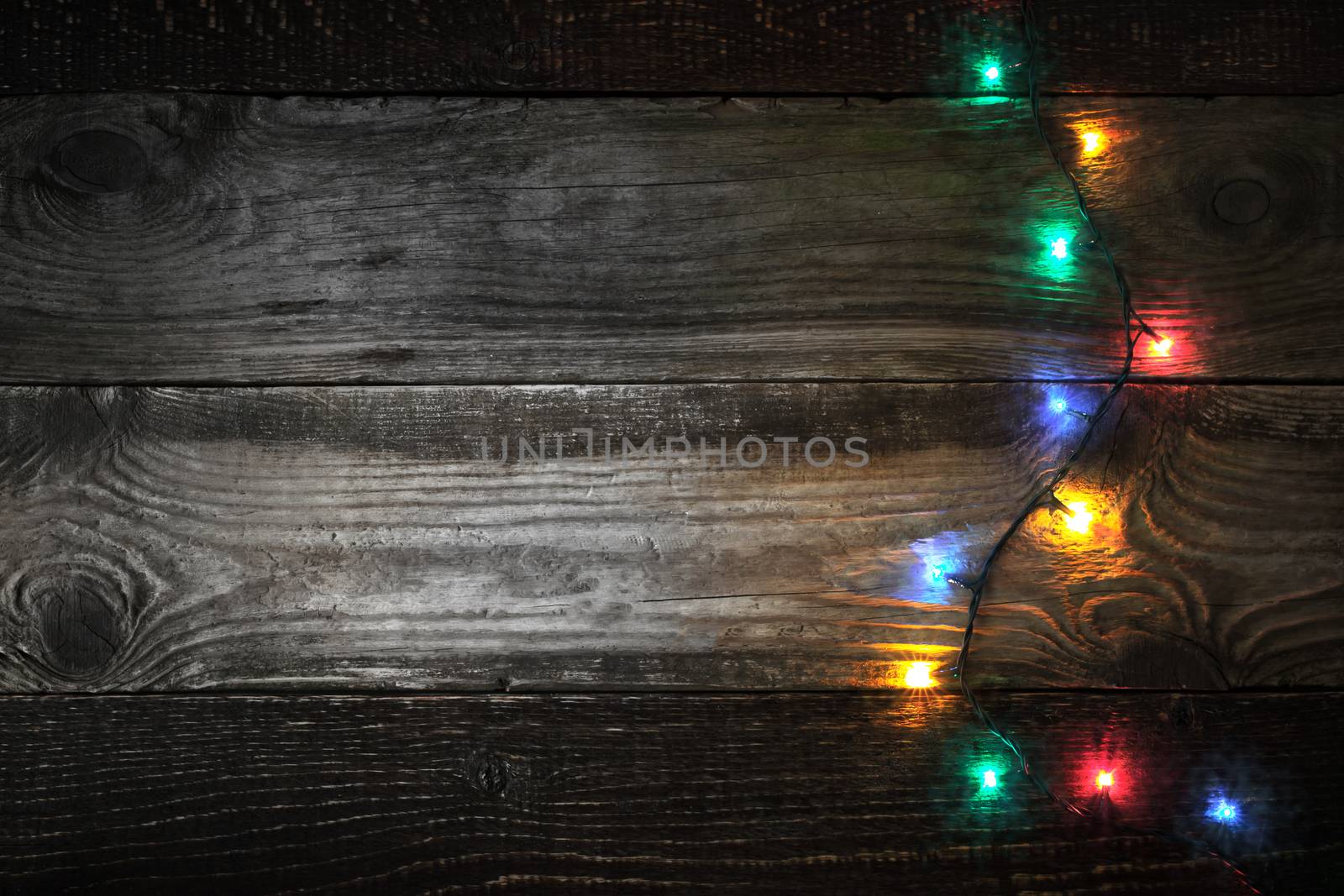 Colorful festoon at the right of the wooden board