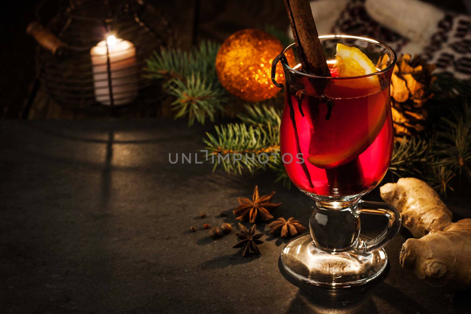 Mulled wine with spices and Christmas decorations horizontal