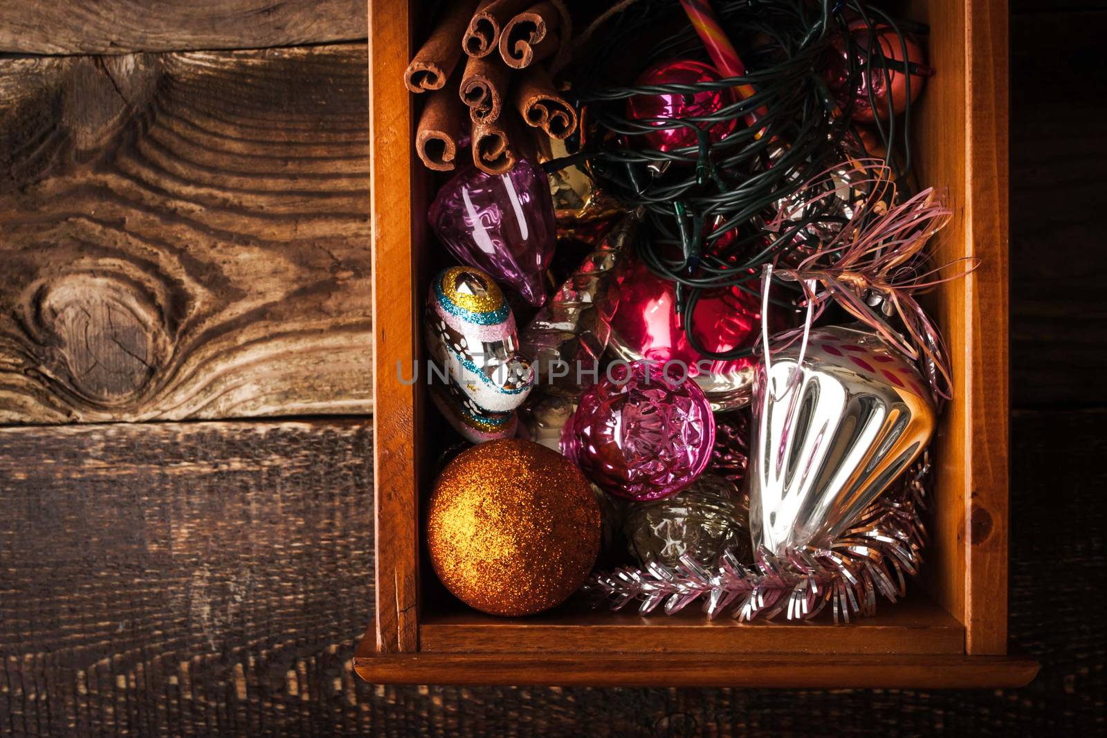 Wooden box with Christmas decorations and gift horizontal