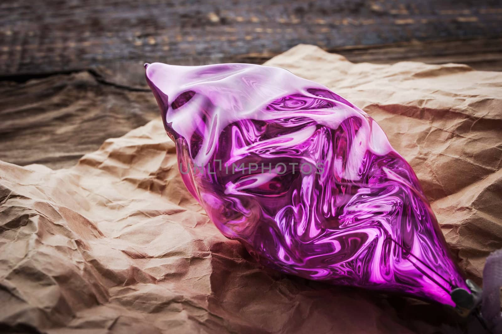 Christmas tree decoration in the crumpled paper close-up