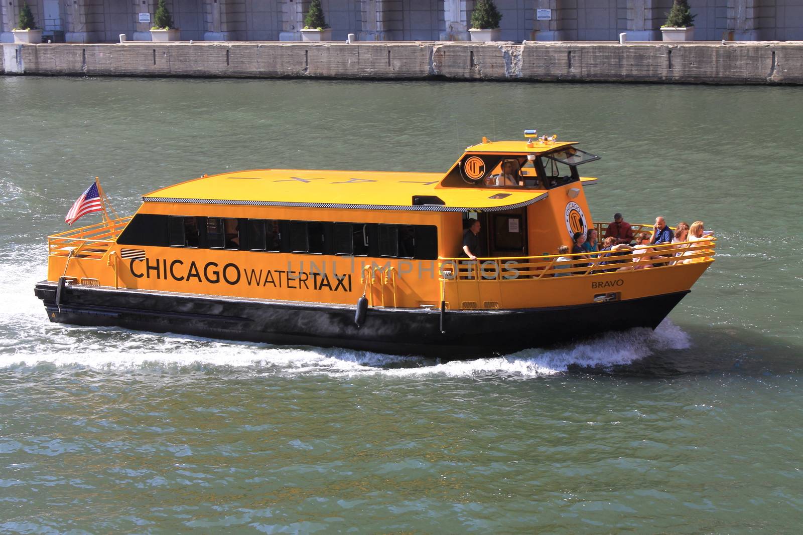 Chicago Water Taxi with passengers on Chicago River.