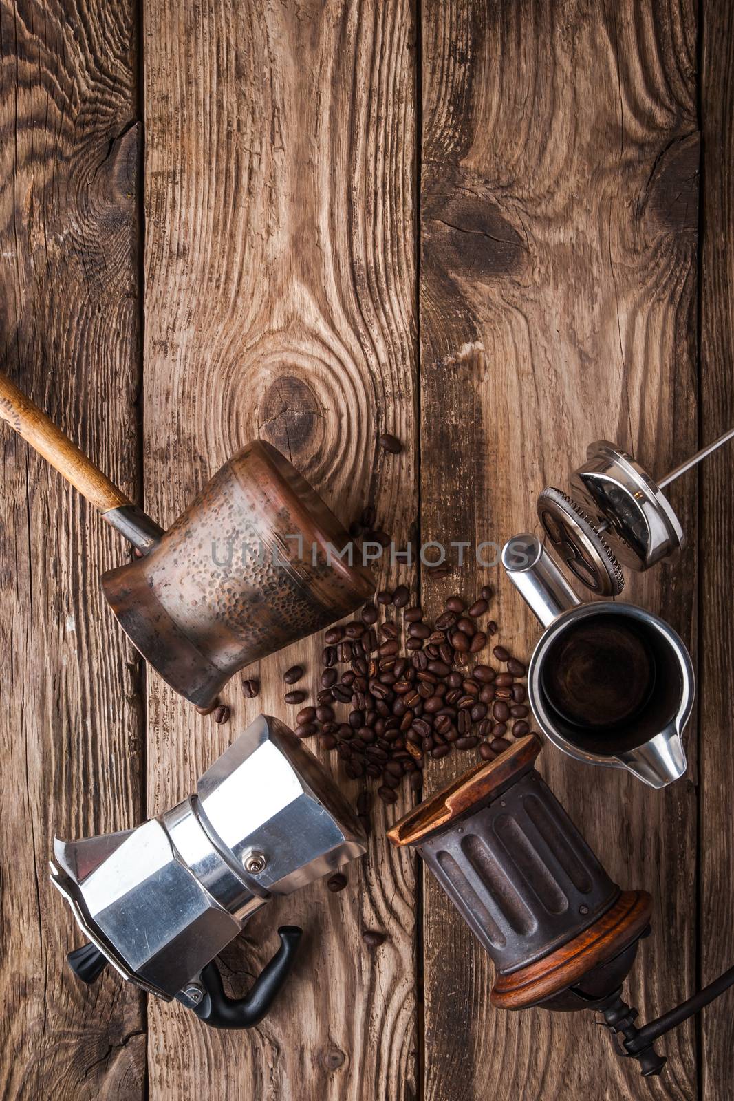 Accessories for coffee on the wooden table vertical