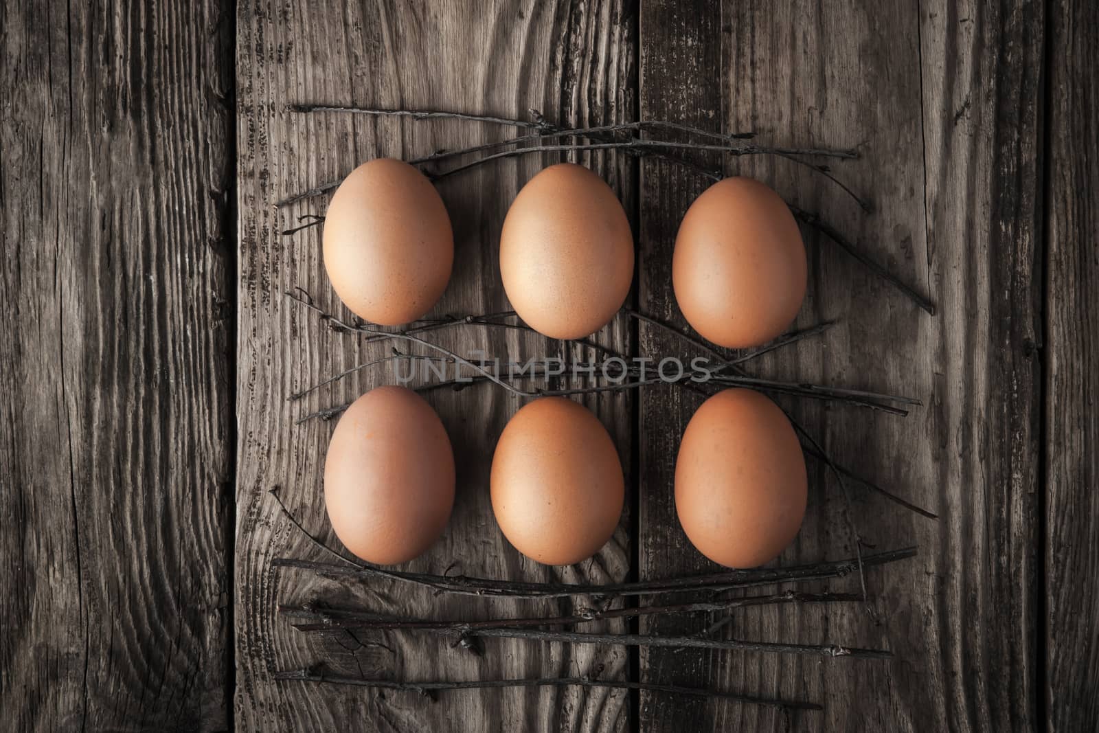 Chicken eggs on a wooden table horizontal