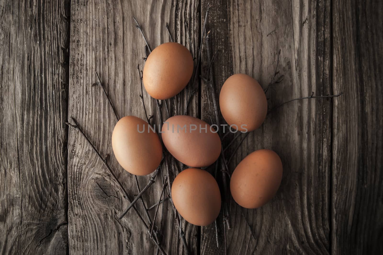 Chicken eggs on a wooden table horizontal
