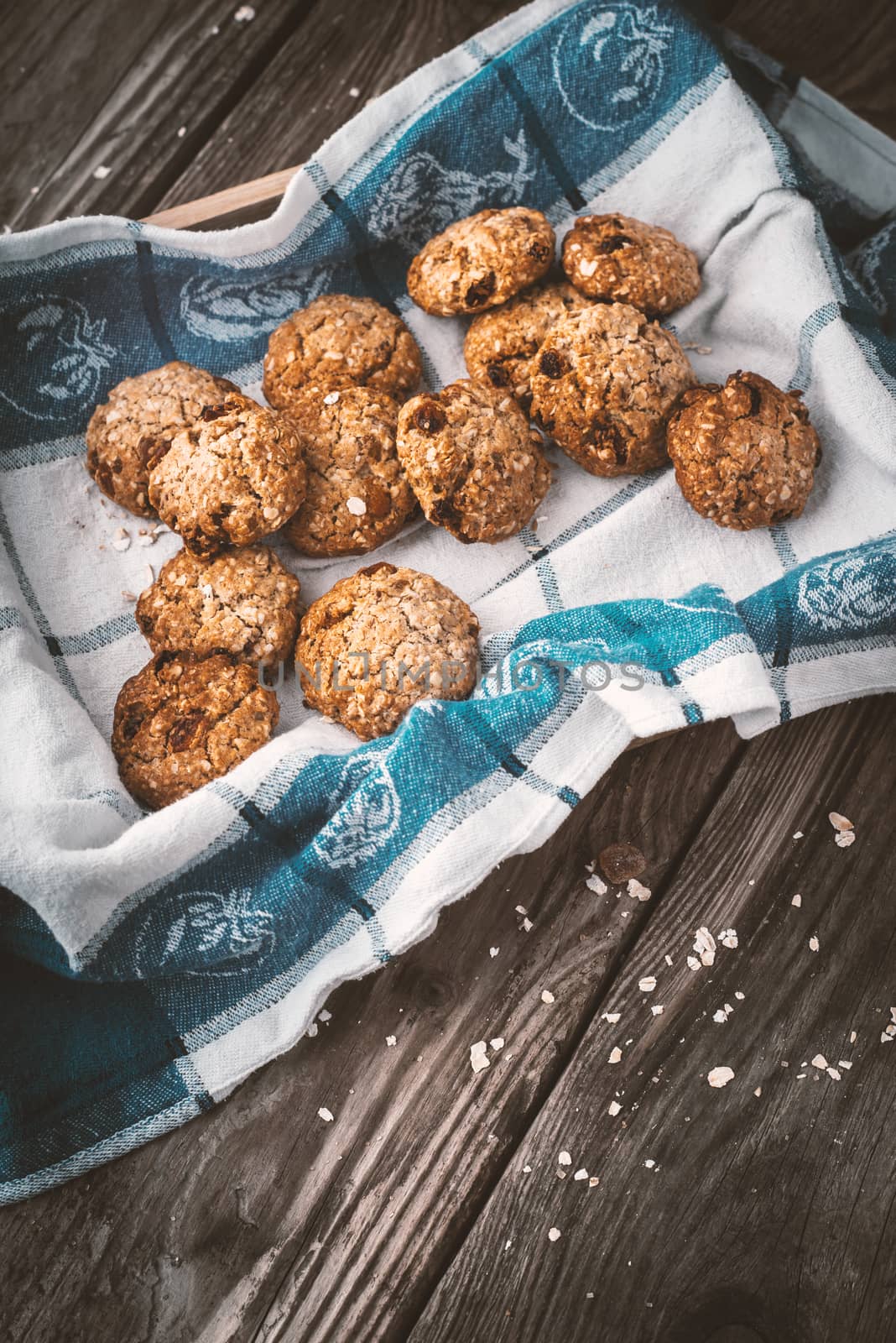 Oatmeal cookies with raisins in a box vertical