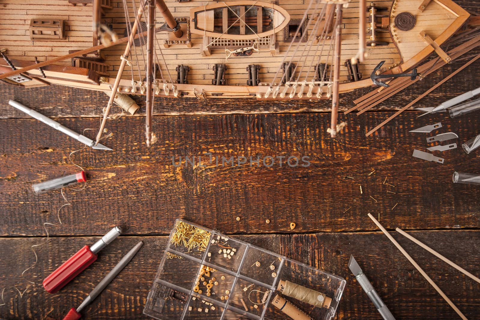 Model ships from the tree on a brown table horizontal
