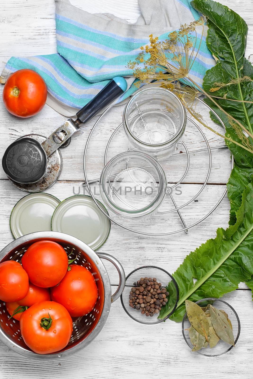 Tomato,spices and cooking utensils for pickling vegetables