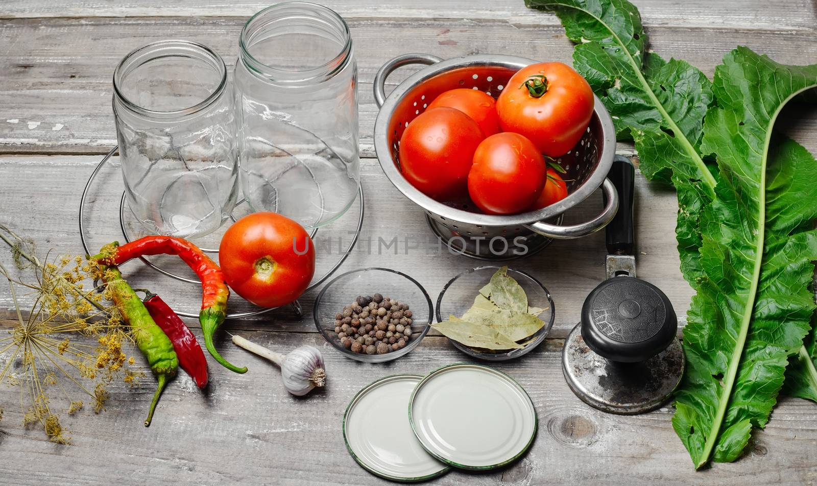 Tomato,spices and cooking utensils for pickling vegetables