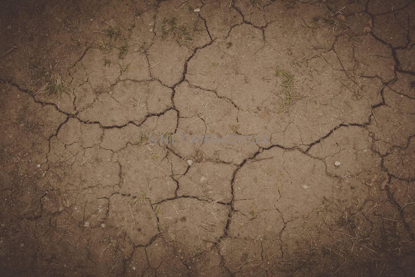 Cracked ground texture background in vintage style