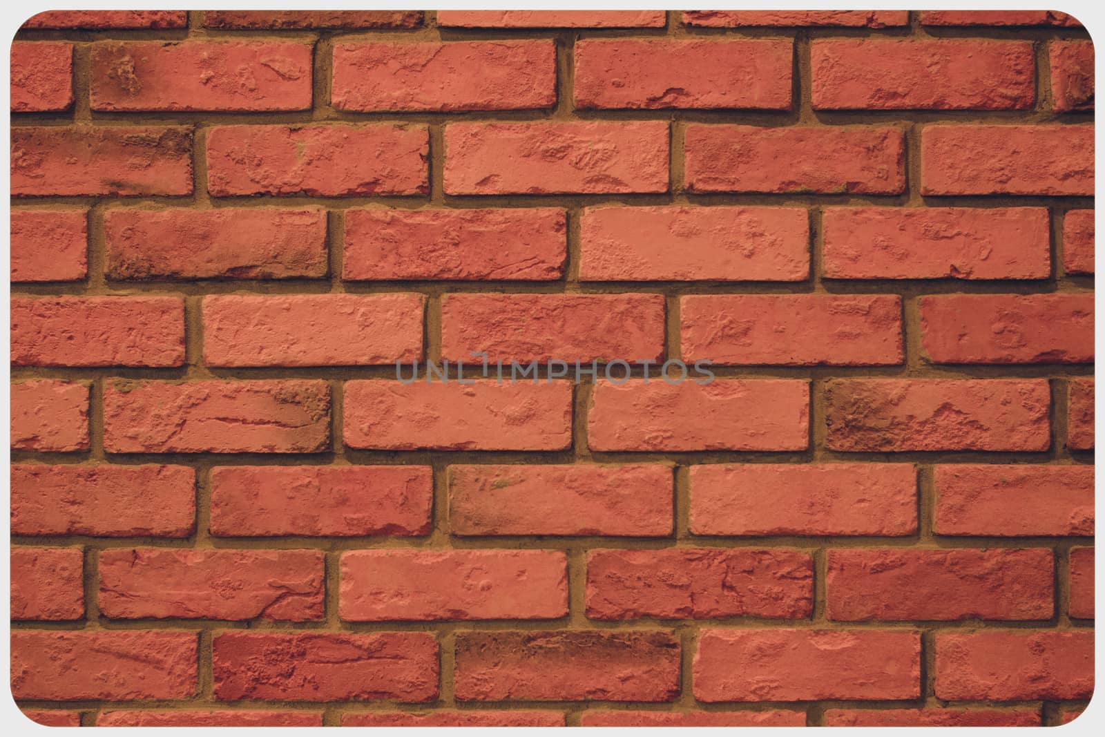 Weathered texture of stained old dark brown and red brick wall background