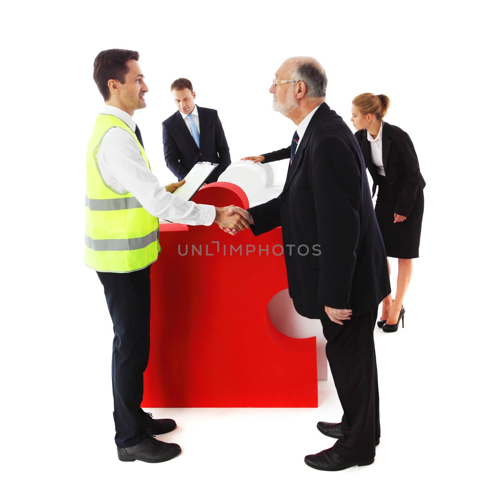 Group of business people recieving jigsaw puzzle of business isolated on white background