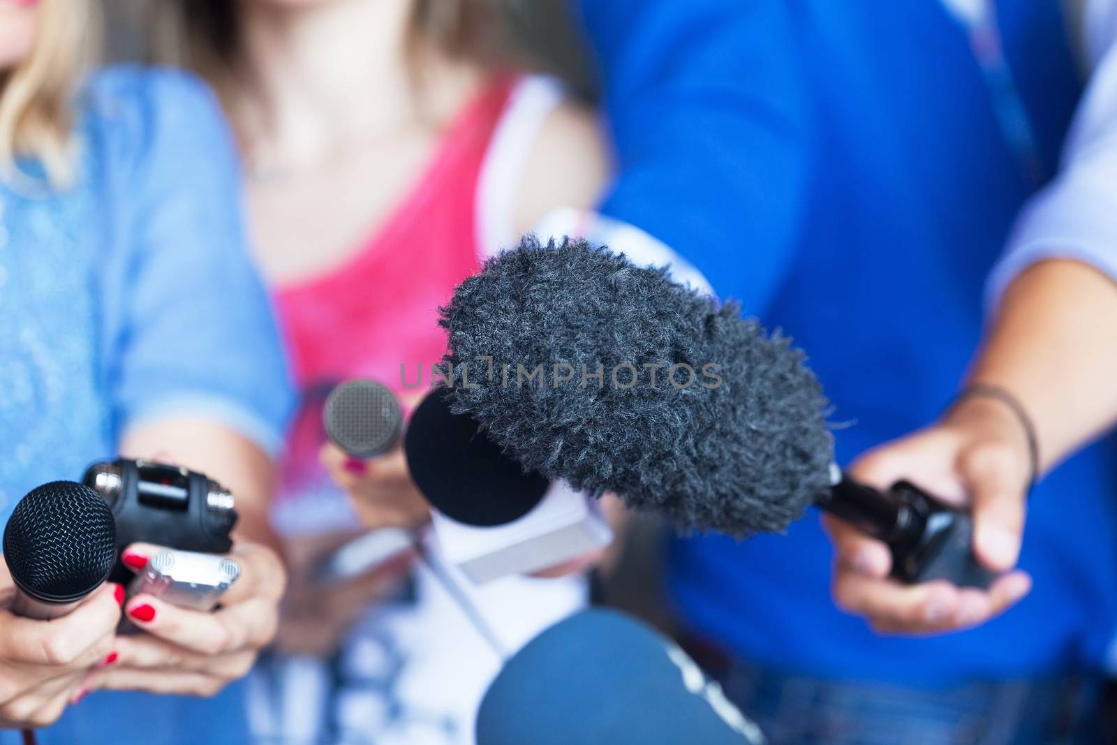 Media interview. Microphones. by wellphoto