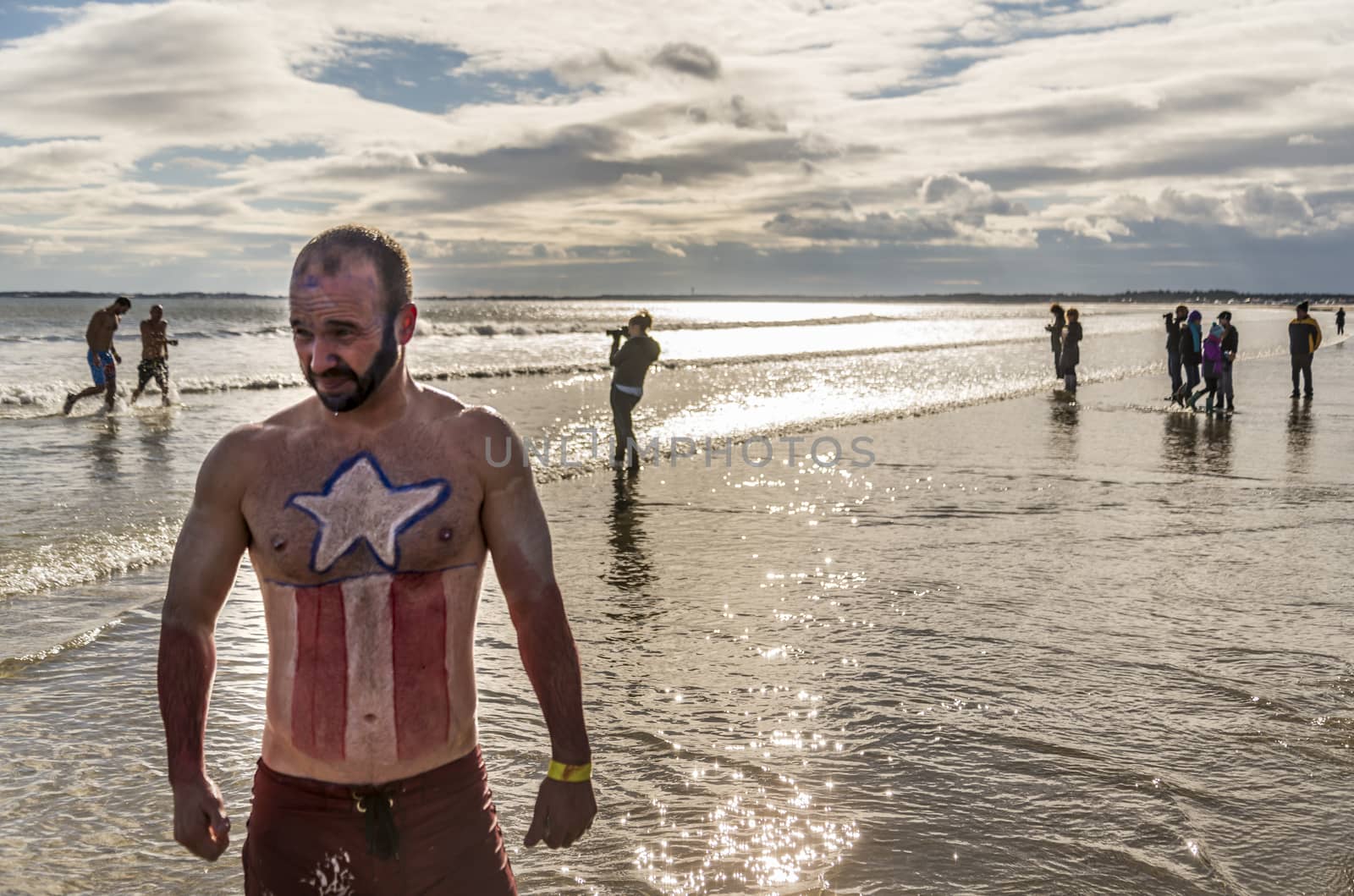 OLD ORCHARD BEACH - JANUARY 1 2016: several hundred people took part in the annual Lobster Dip Plunging on January 1, 2016 in Old Orchard Beach, Maine USA