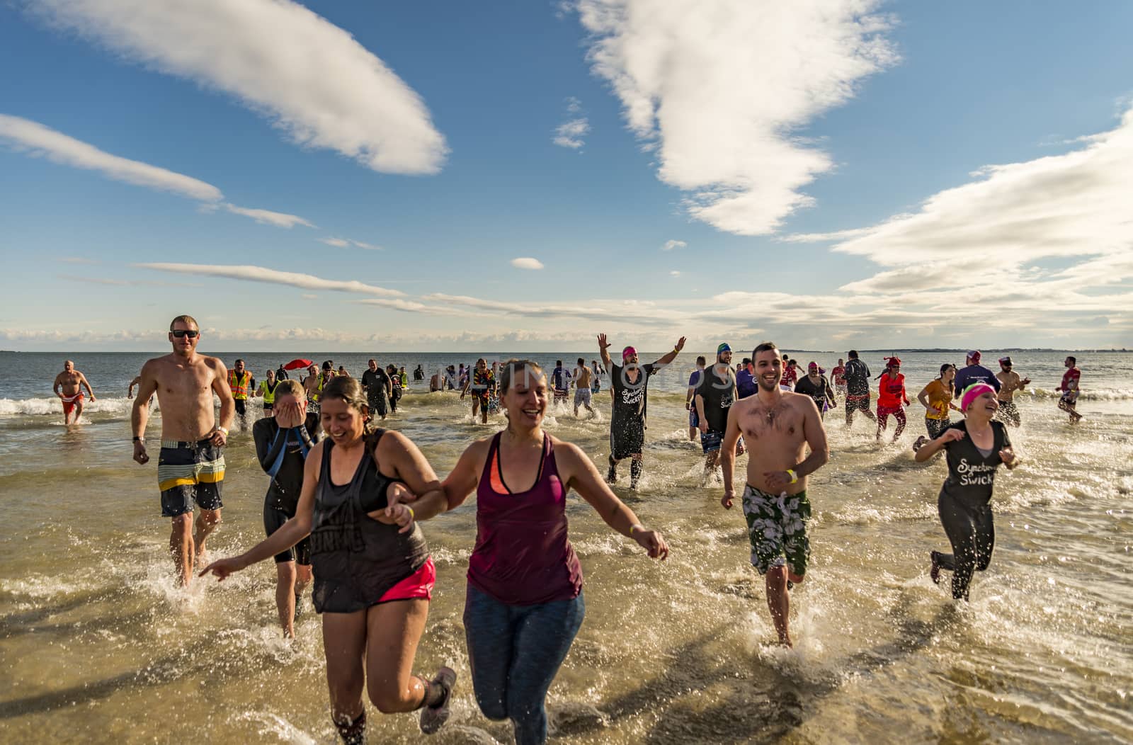 OLD ORCHARD BEACH - JANUARY 1 2016: several hundred people took part in the annual Lobster Dip Plunging on January 1, 2016 in Old Orchard Beach, Maine USA