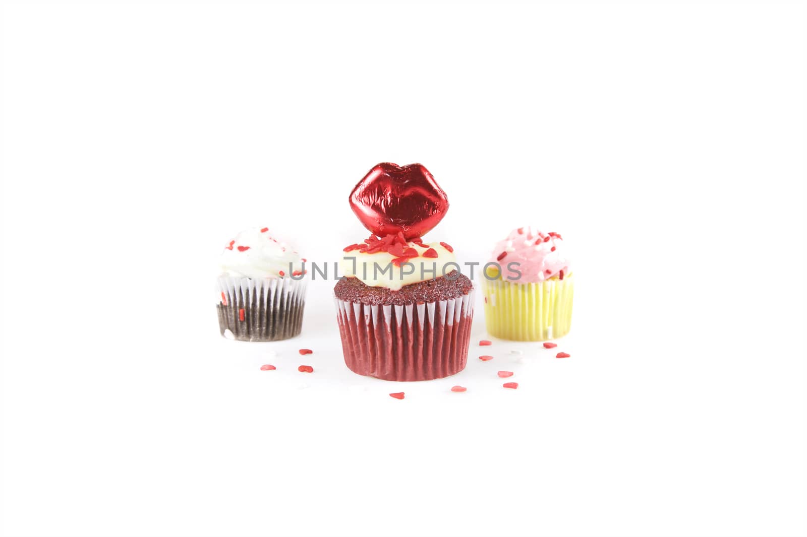 Cupcake in a row, isolated on a white background