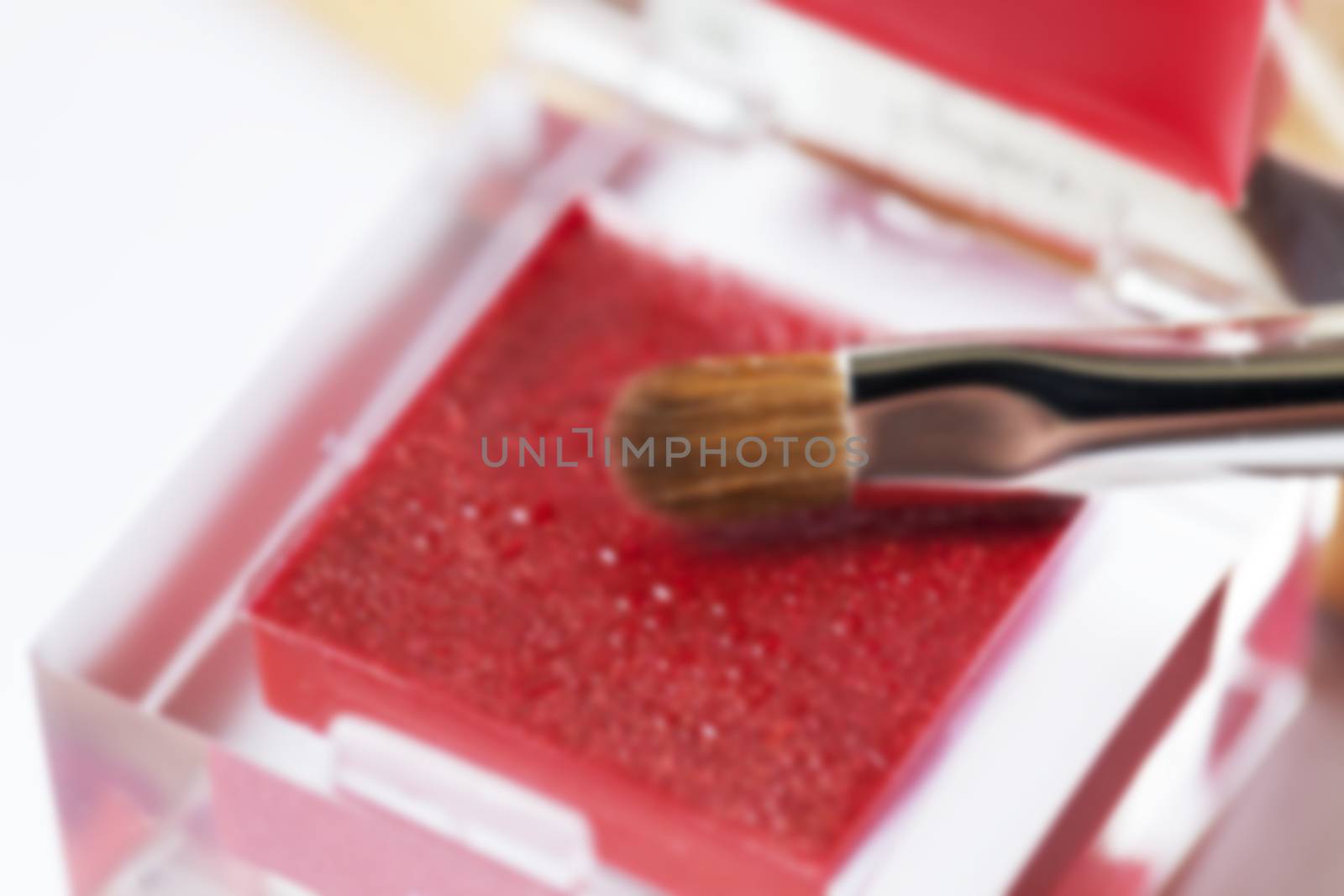 photographed close-up cosmetics female red lip, defocused, defocus