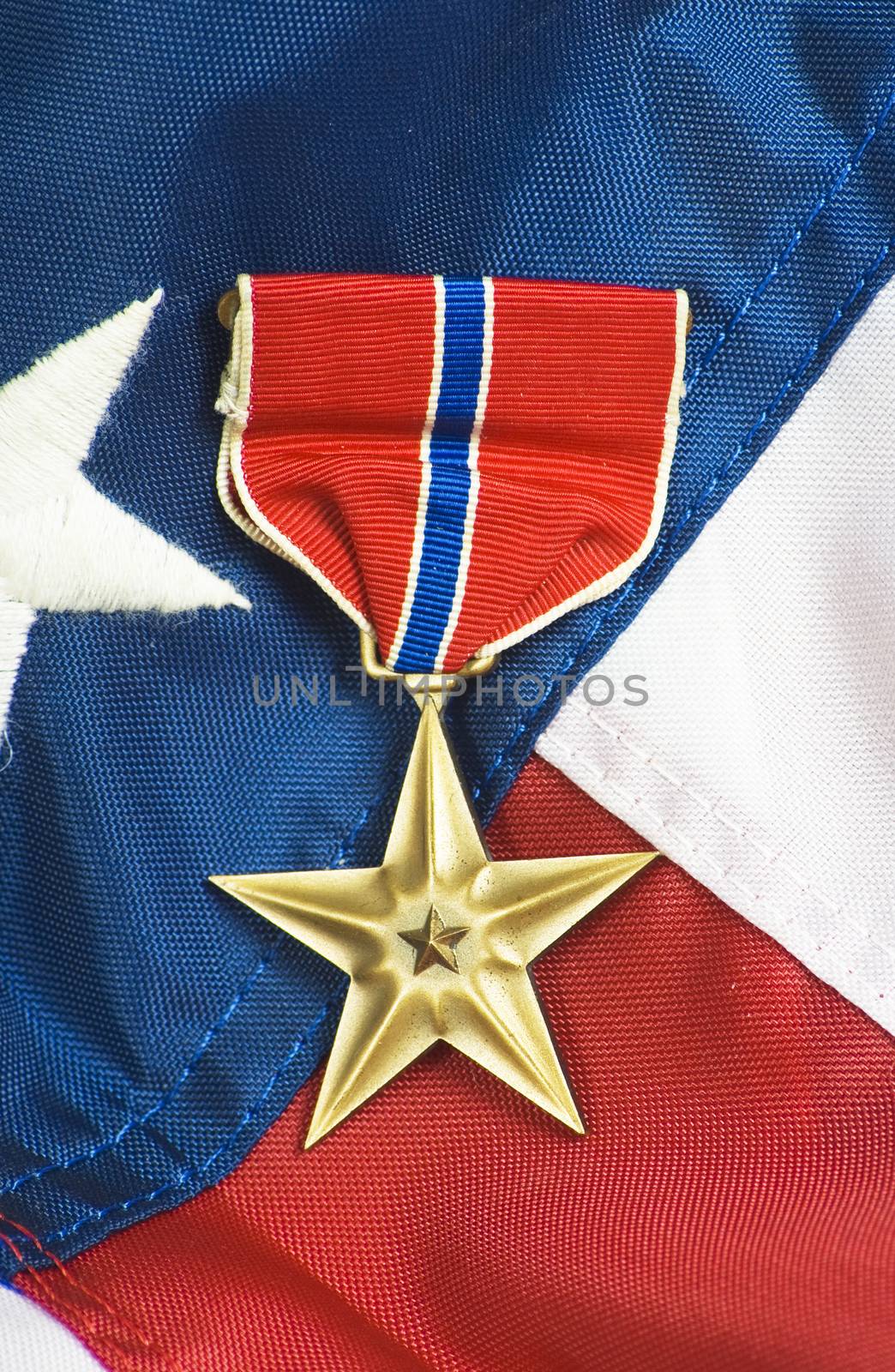 Bronze star, awarded for valor in combat.