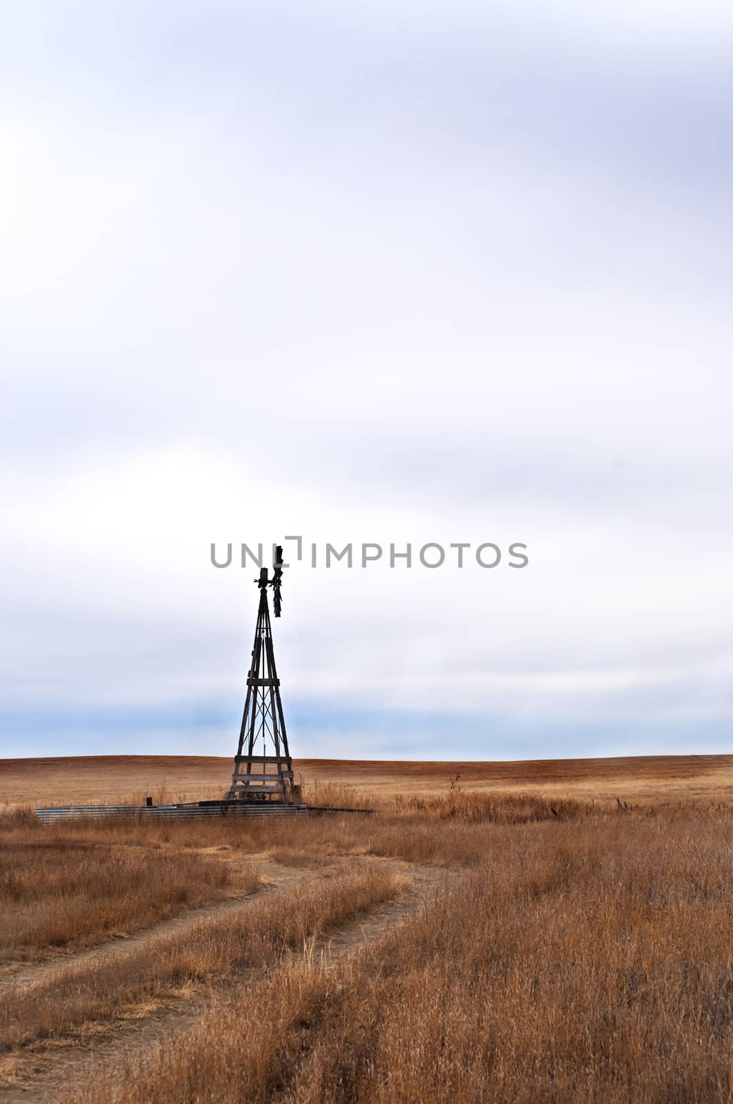 Windmill to pump livestock water on the eastern Colorado plains in the USA.
