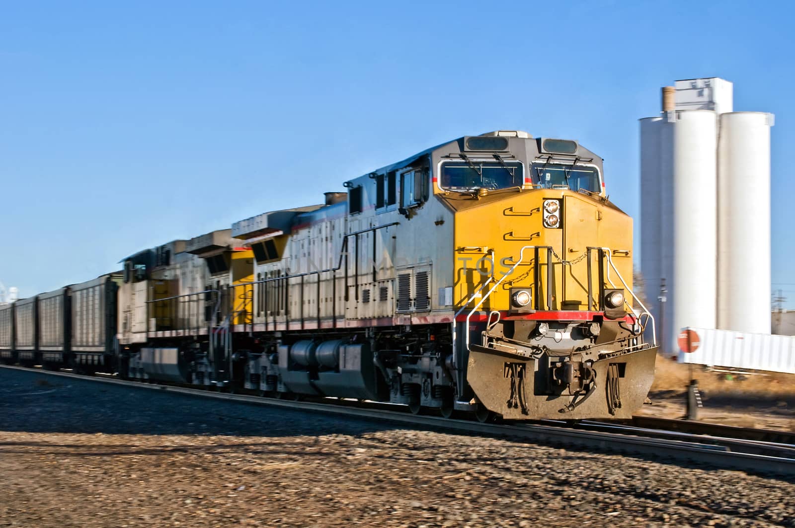 Freight train going through a rural Colorado town