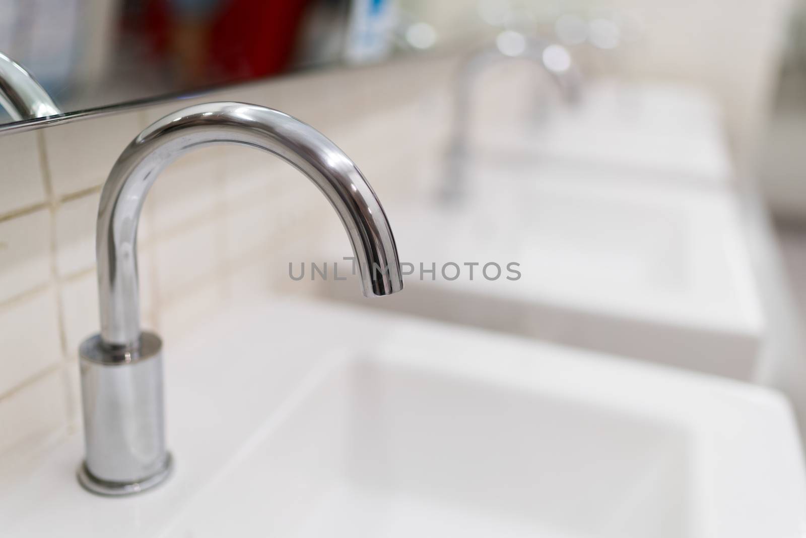 Modern water faucet in toilet, depth of field effect by beer5020