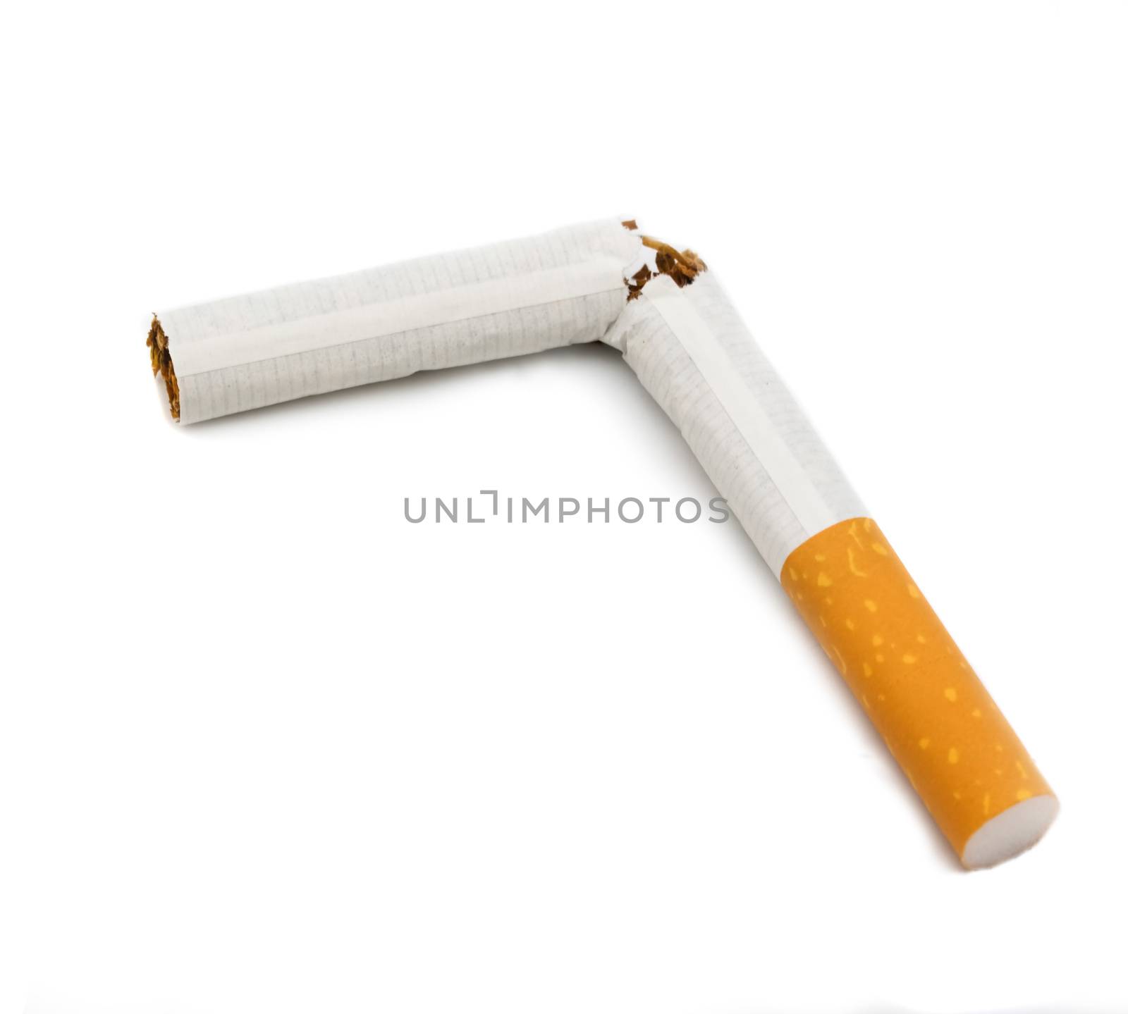Broken cigarette isolated on white background