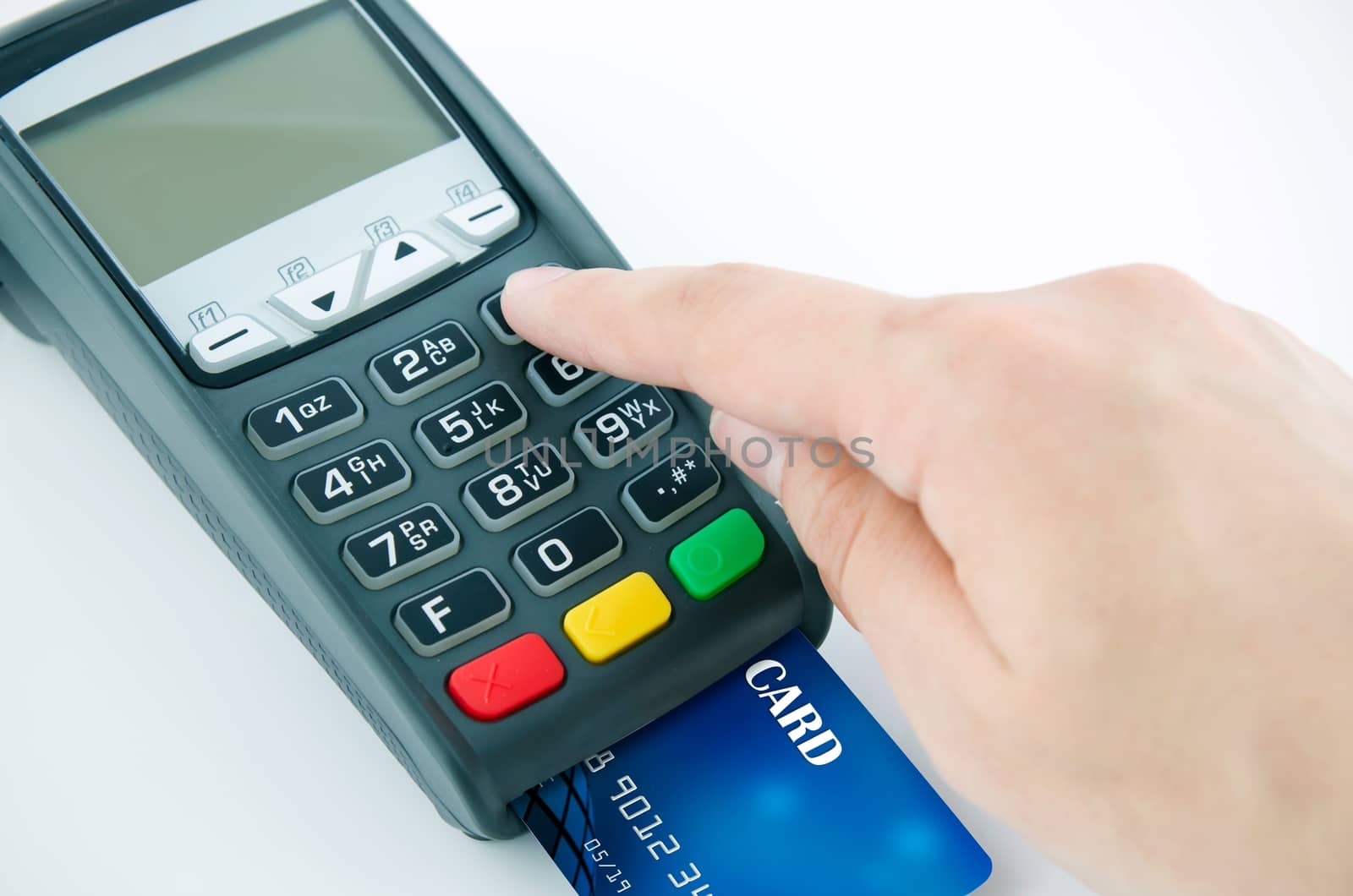 Man using payment terminal keypad, enter personal identyfication number