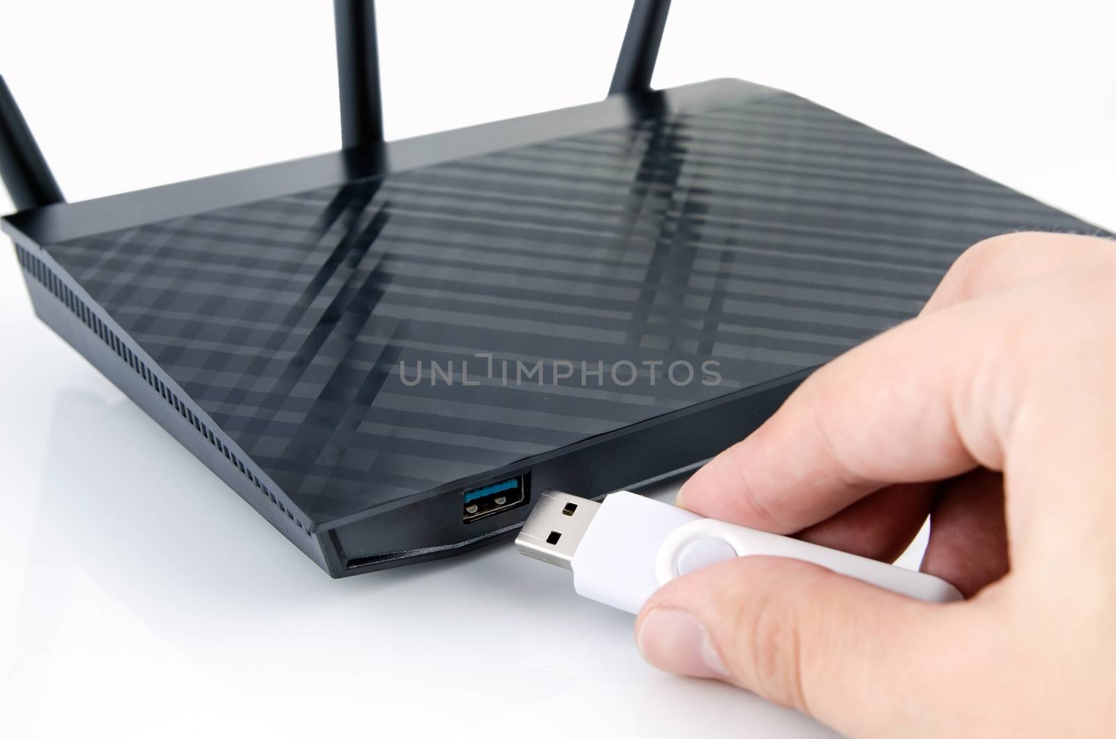 Modern wireless wi-fi router with DLNA server. Media player from USB flash disk