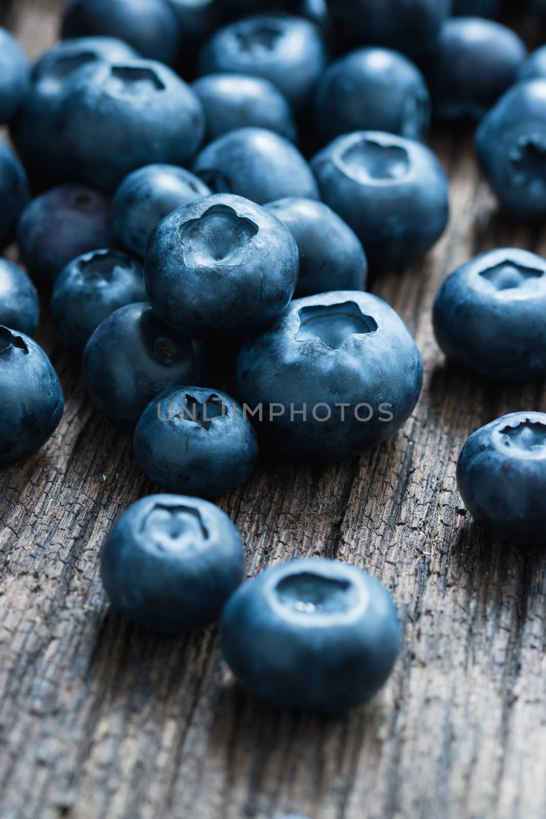 Blueberry organic on wooden background