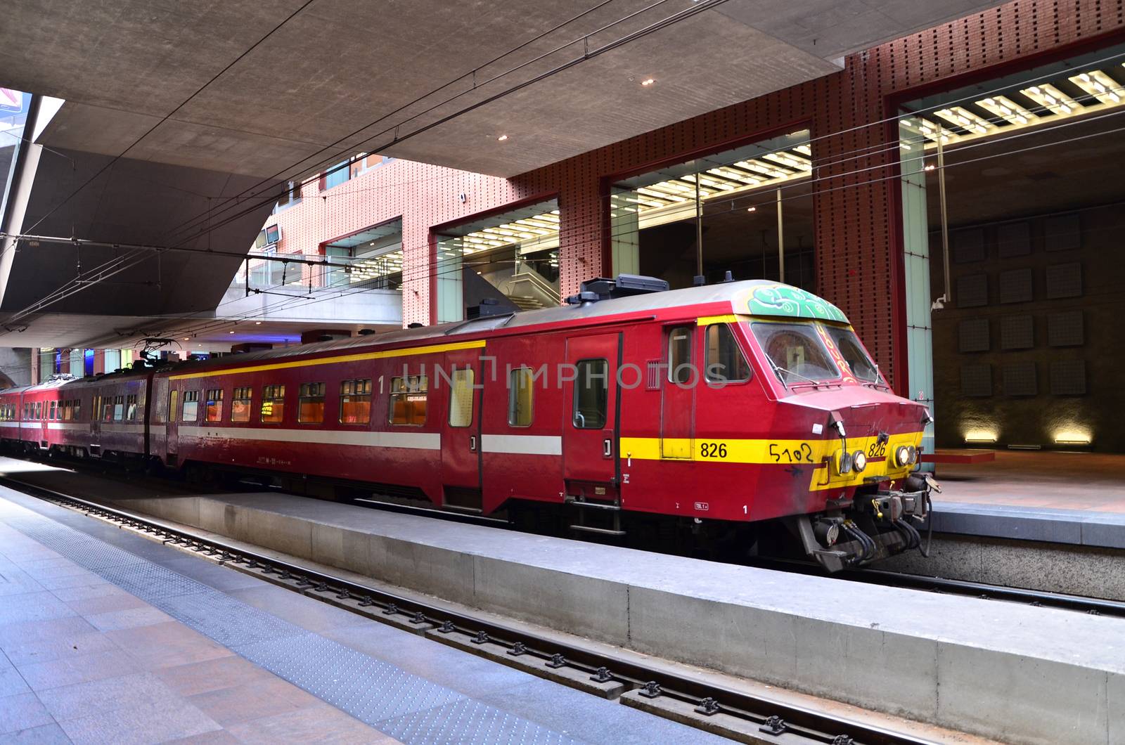 Antwerp, Belgium - May 11, 2015: Belgian train in Antwerp Central station on May 11, 2015 in Antwerp, Belgium. The station is now widely regarded as the finest example of railway architecture in Belgium.