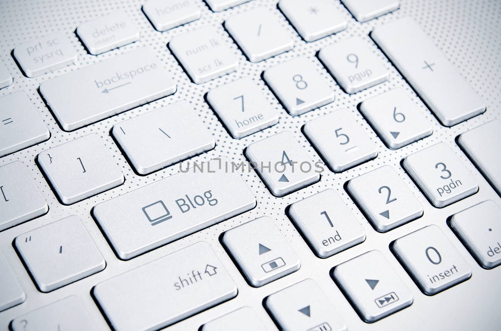 Blog key on white flat keyboard of laptop