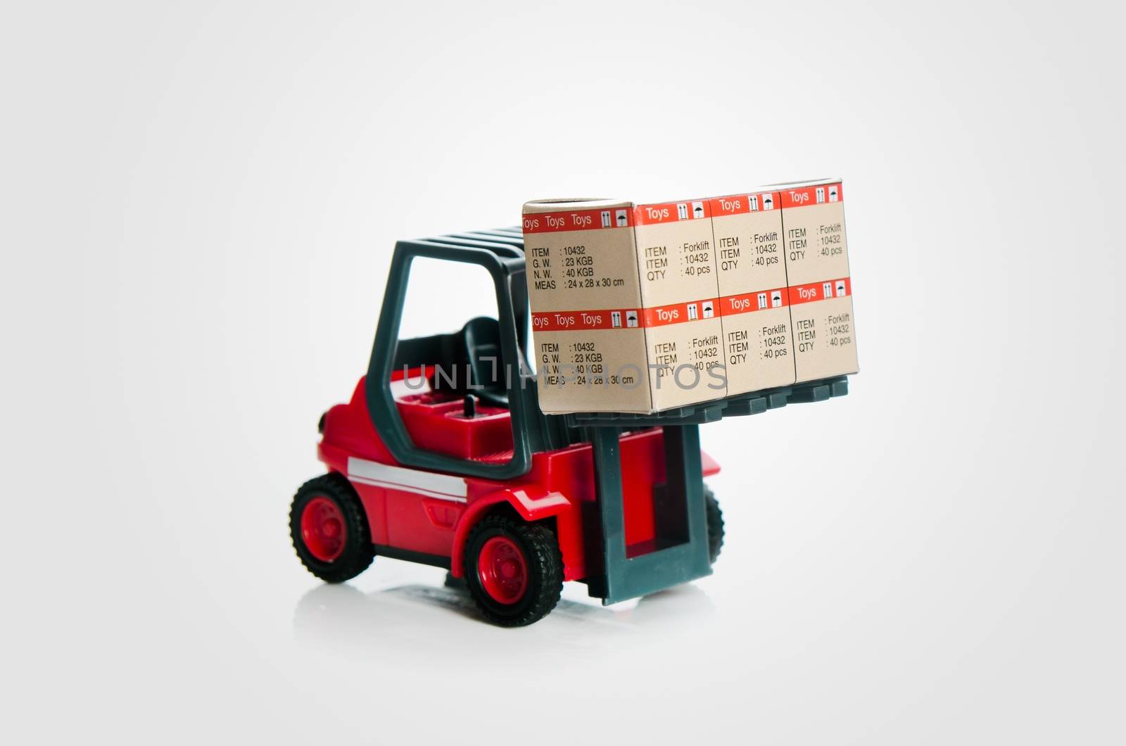 Forklift truck toys with boxes. Concept of international freight by simpson33