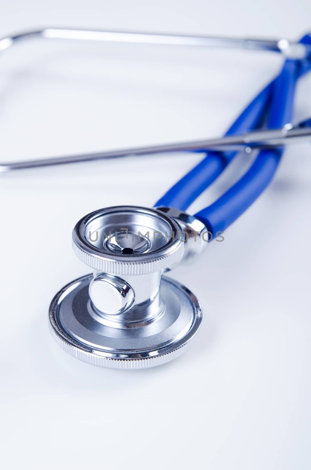 Close up of medical stethoscope isolated on white background