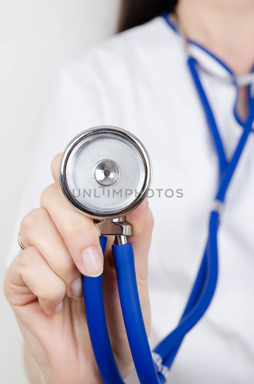 Doctor holding a stethoscope by simpson33