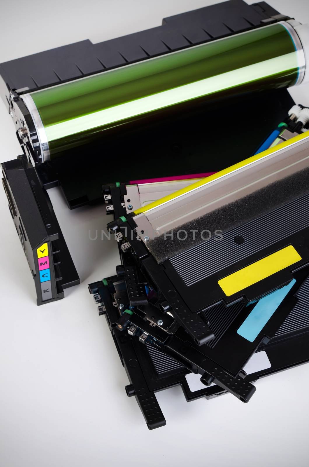 Toner cartridge set for laser printer. Computer supplies on white background.