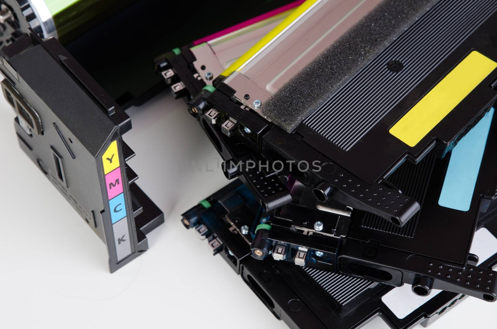 Toner cartridge set for laser printer. Computer supplies on white background.