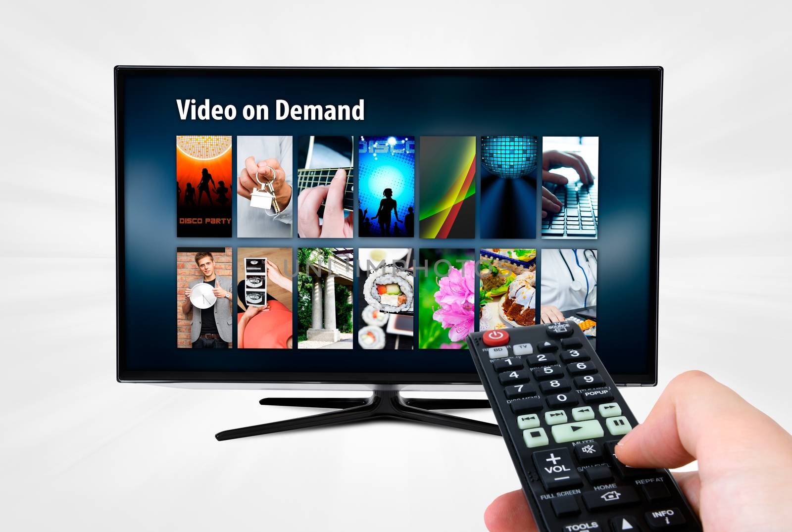 Video on demand VOD service on smart TV. Remote control in hand.