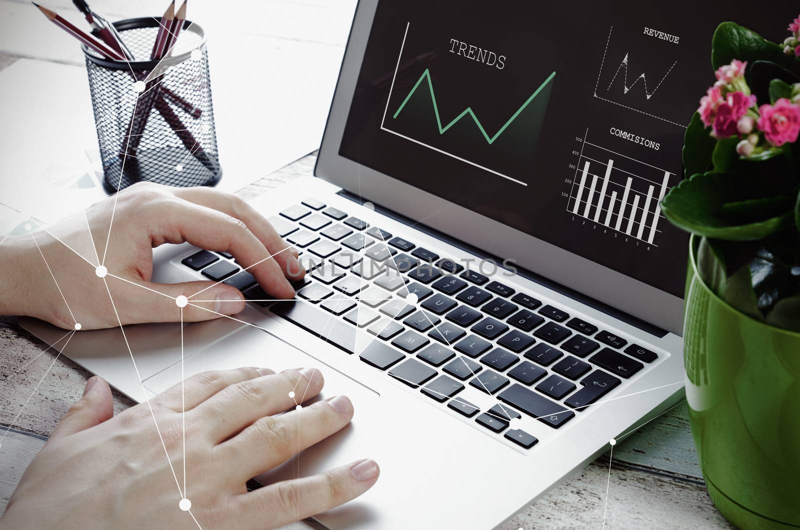 Man working with modern laptop in office. Hands typing on keyboard