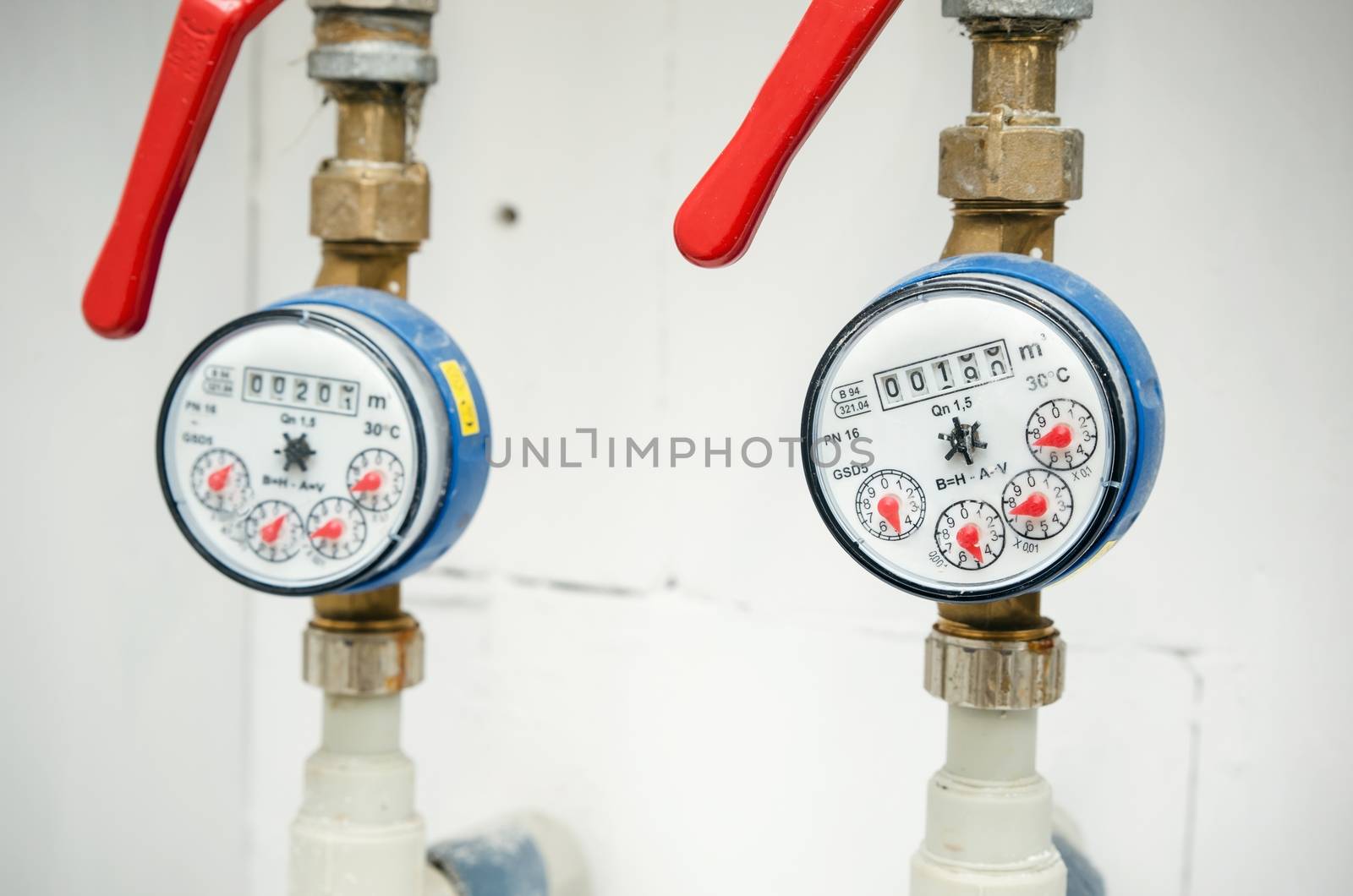 Sanitary equipment. Pair of meters of the water close up
