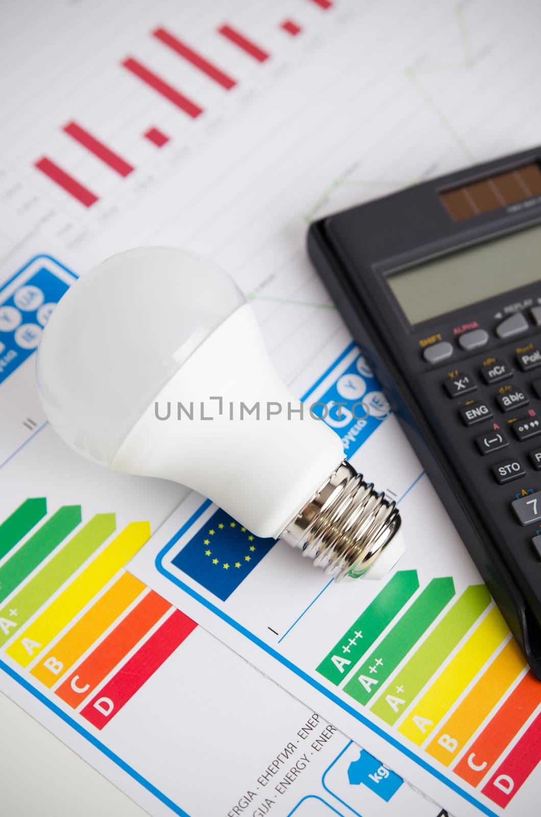 LED light bulb on energy efficiency chart. by simpson33