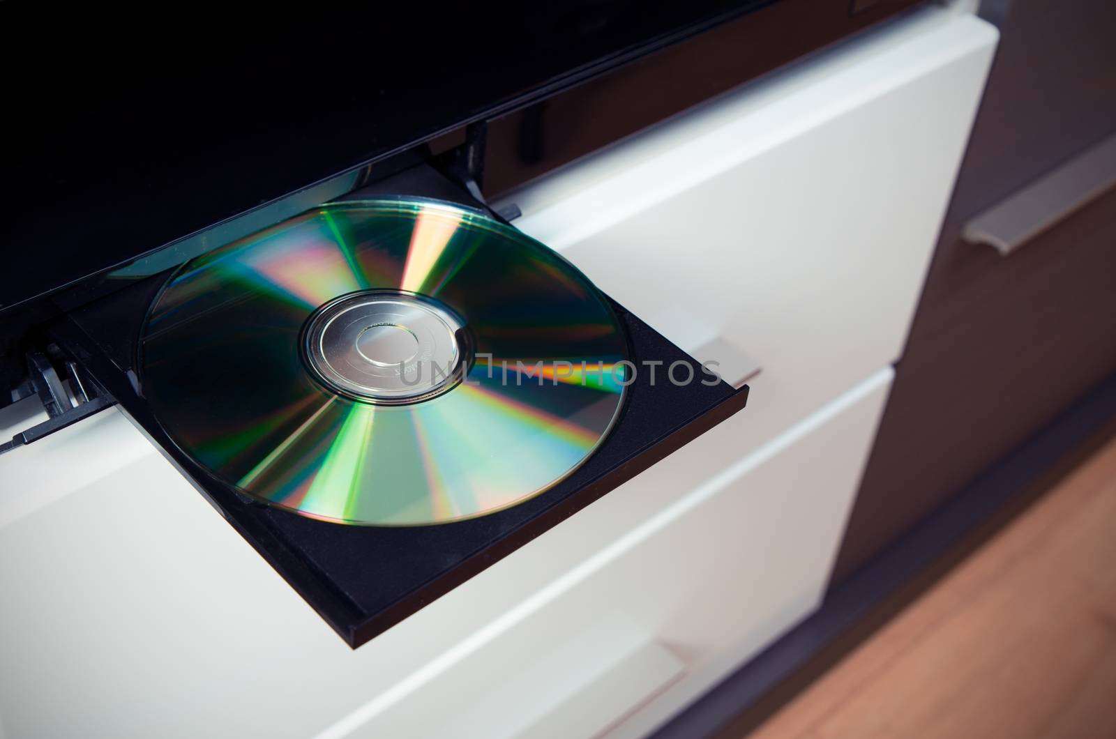 CD or DVD player with inserted disc by simpson33