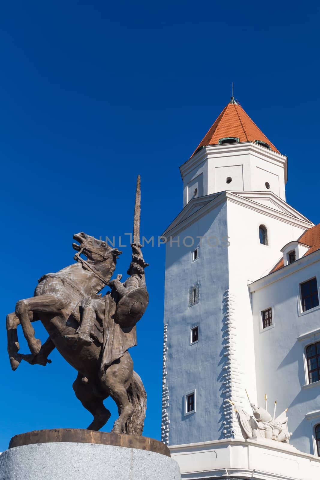 Statue of King Svatopluk and castle in Bratislava, Slovakia by YassminPhoto