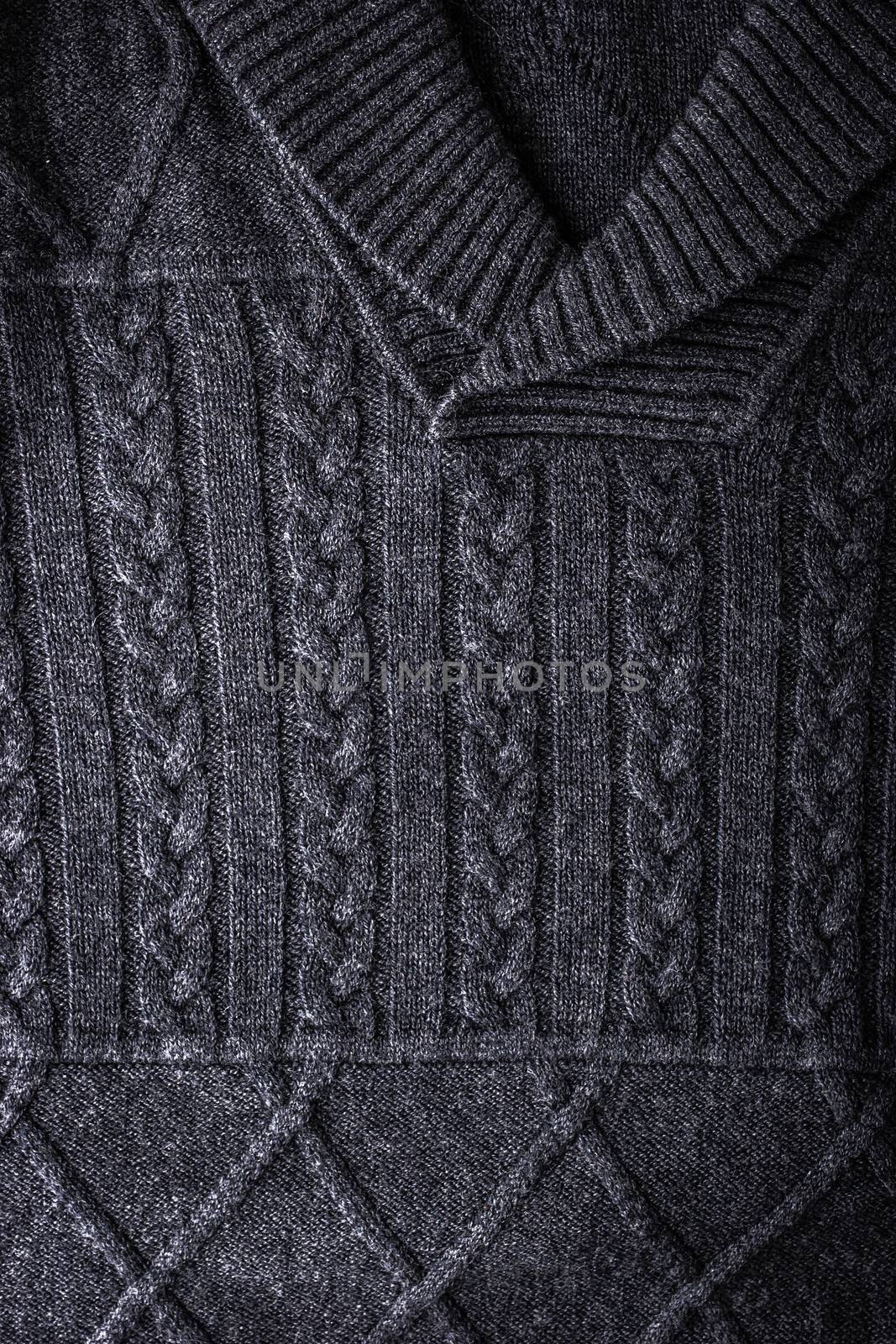 Grey figured sweater background vertical
