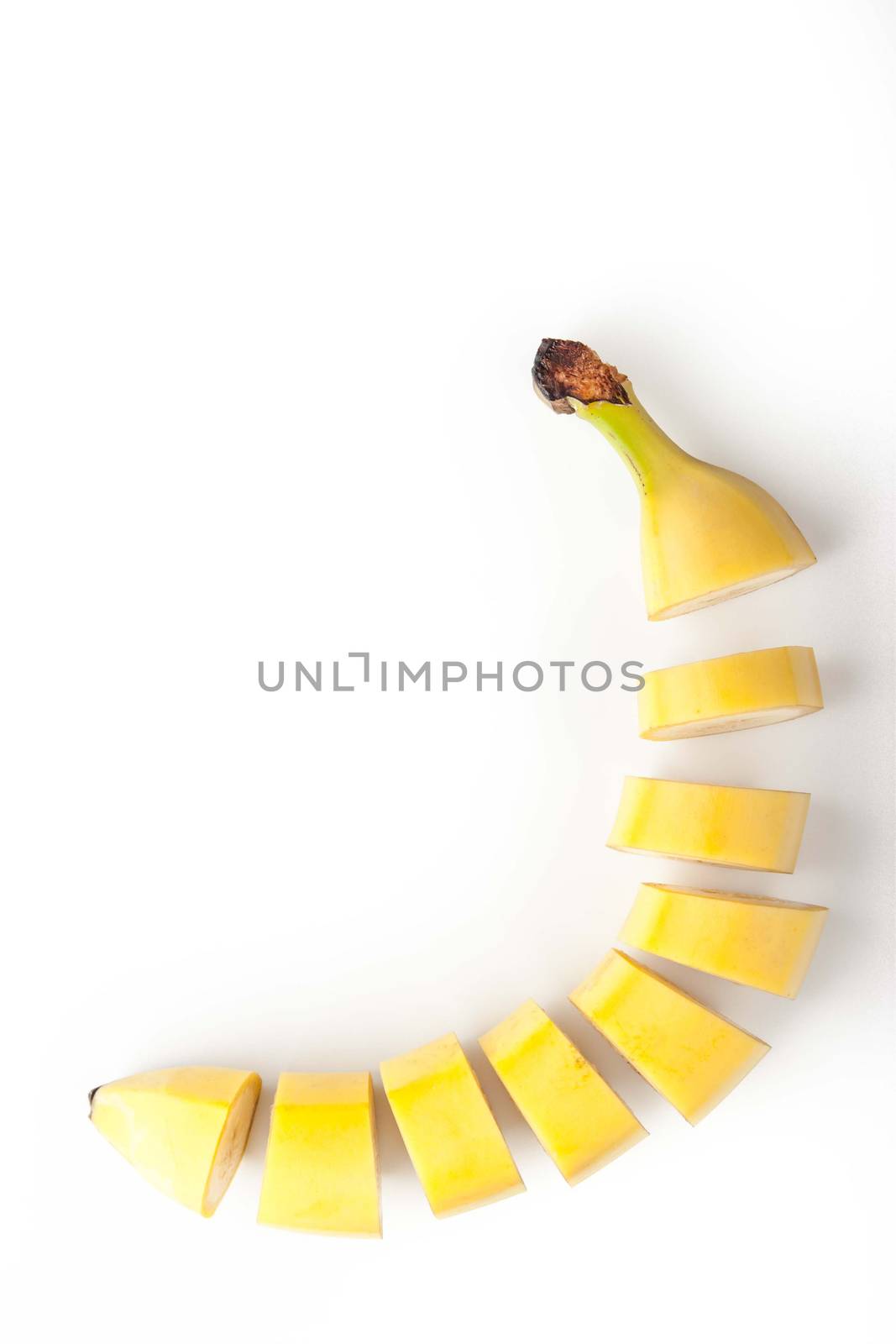 Sliced banana on the white background vertical