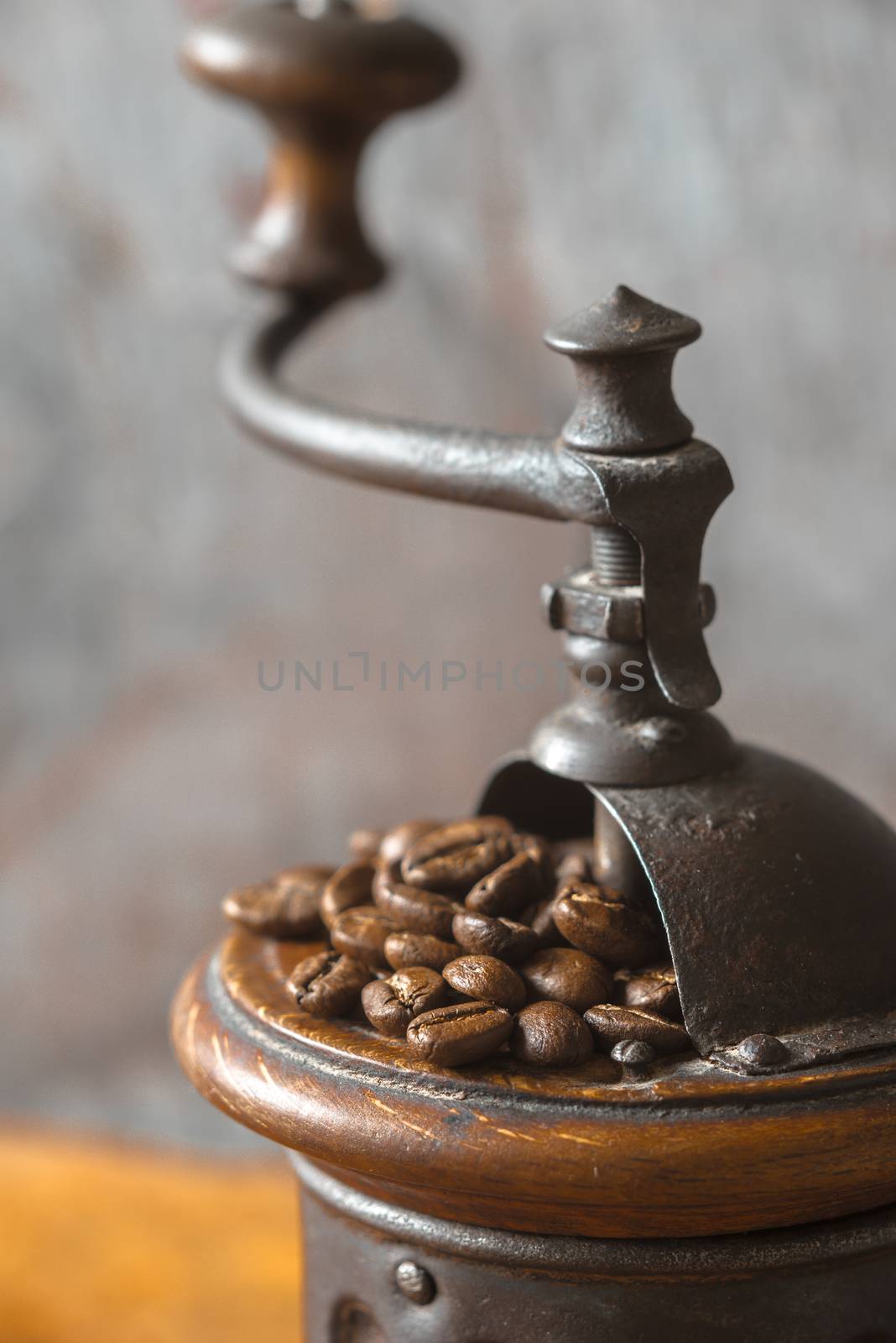 Coffee mill with coffee beans vertical