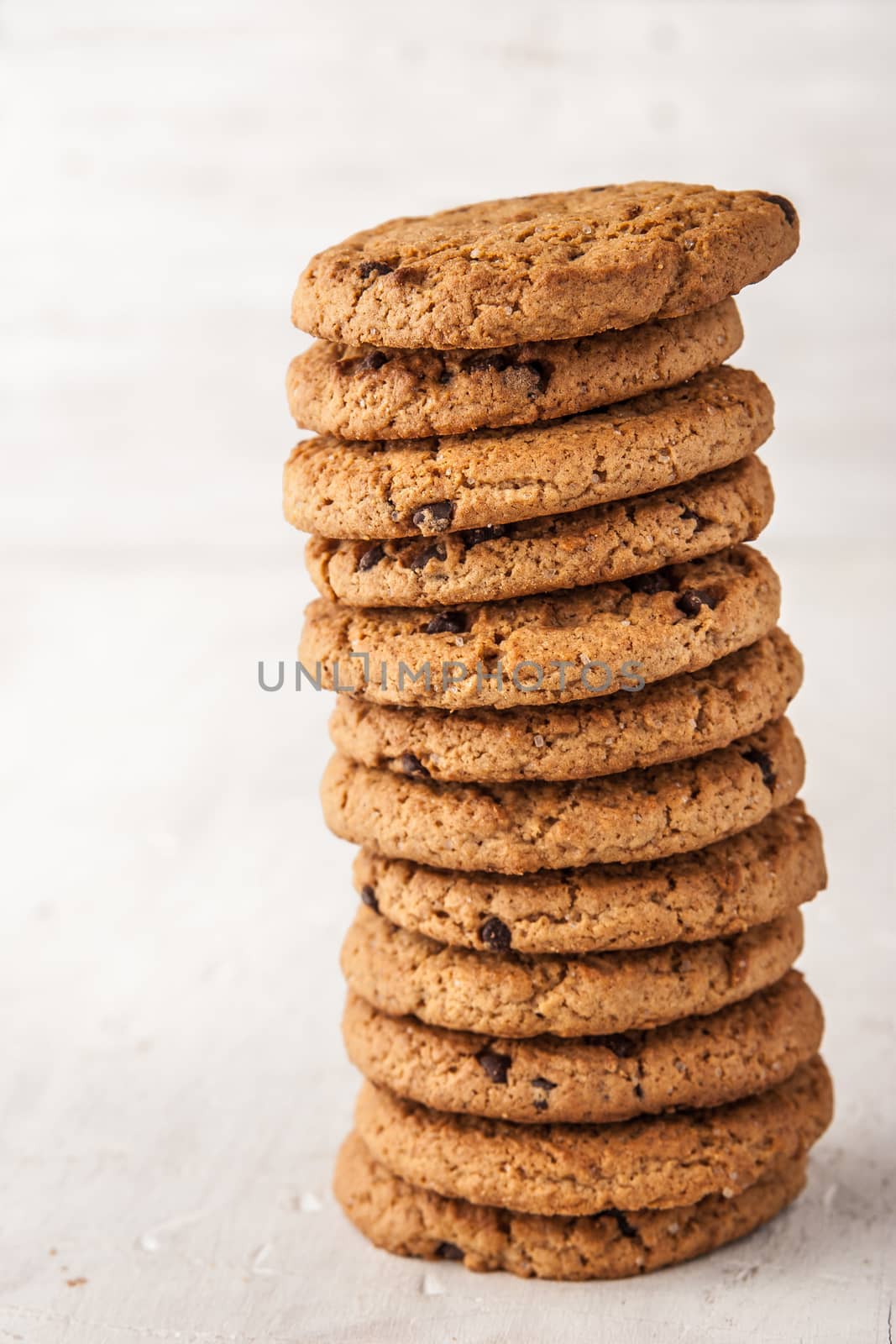 Cookies with chocolate chips  on the white tableФС