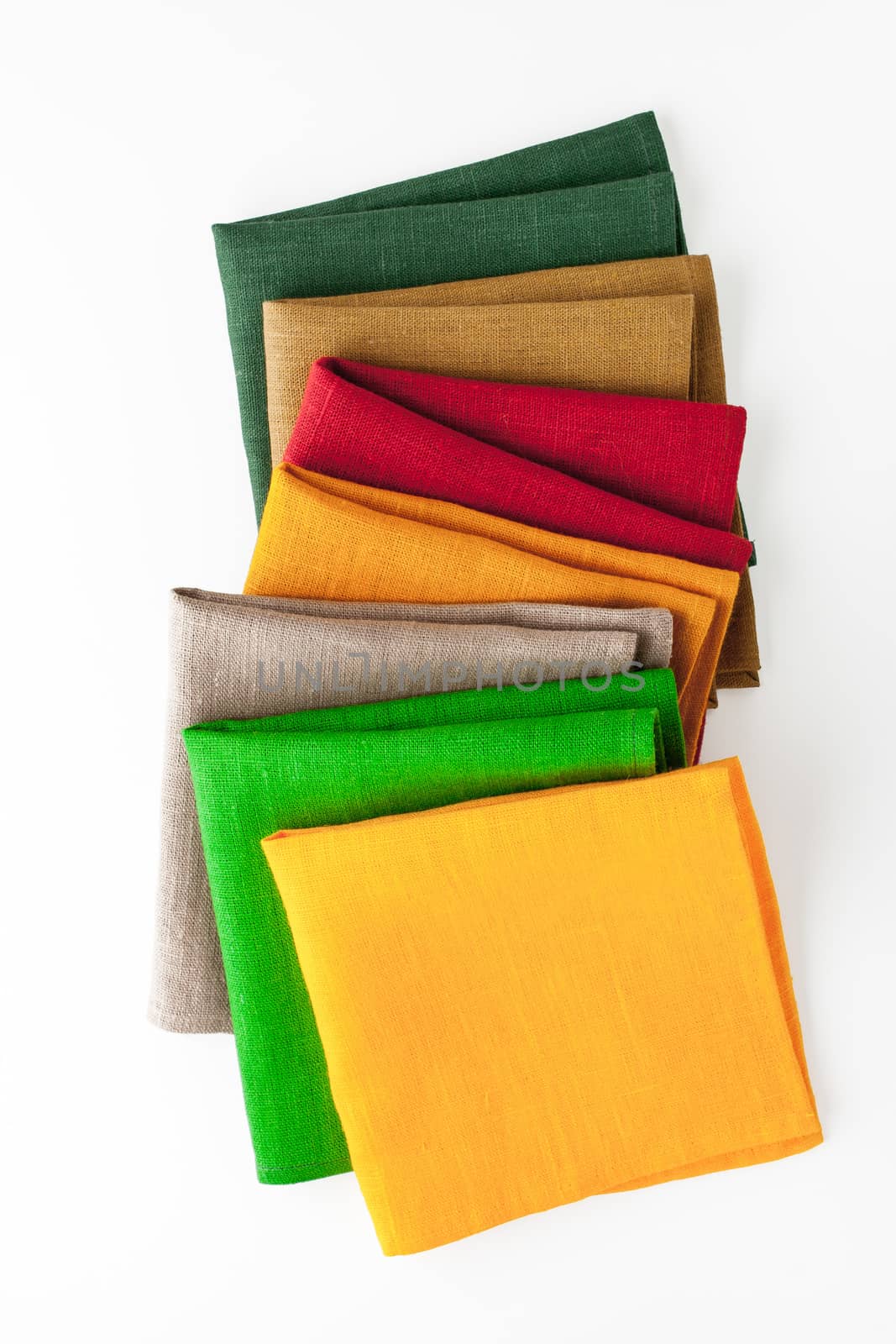 Colorful napkins  on the white background  vertical